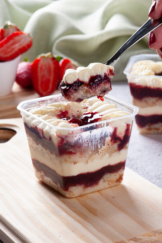 Strawberry cake in the pot for delivery.  Copy space.